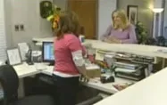 Karen greets receptionist